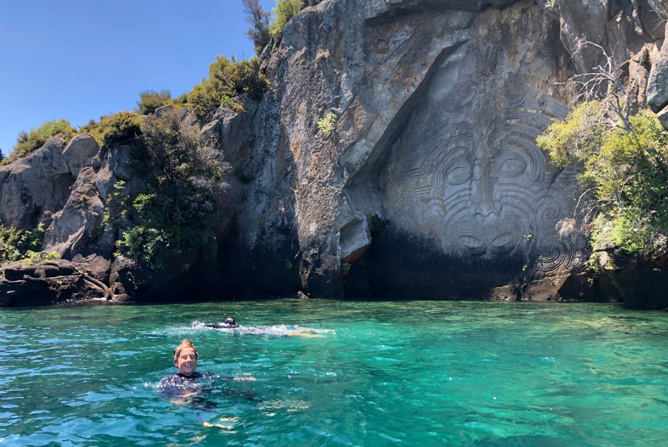 Swimming to Ngātoroirangi Mine Bay Māori Rock Carvings on Lake Taupō